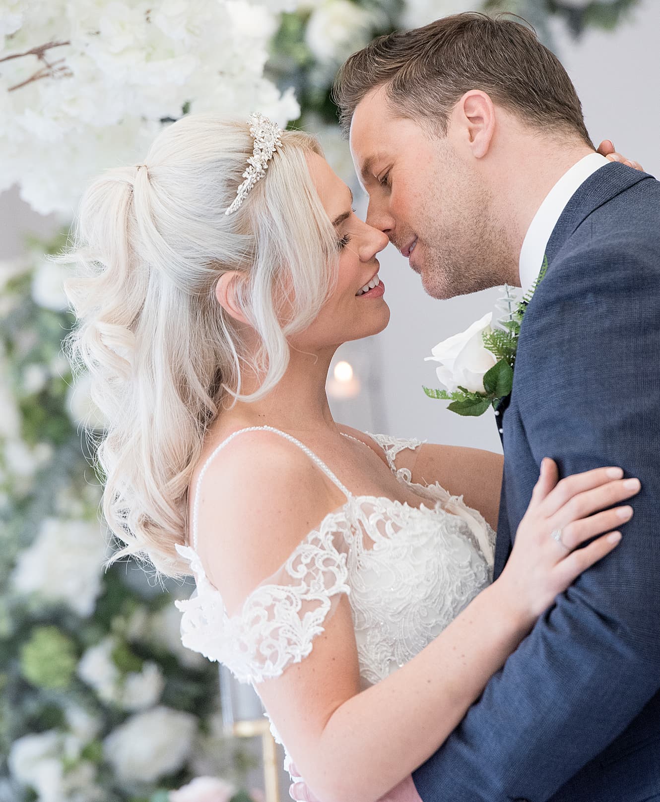 Couple embracing on their wedding day